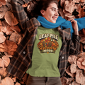 Leaf pile graphic recovery mode T-shirt in olive green with fall leaves front print