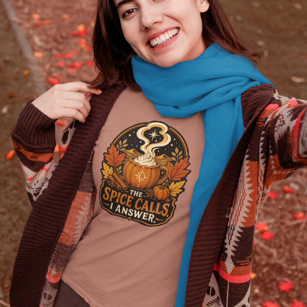 Tan T-shirt with front circular pumpkin spice cauldron graphic text "I ANSWER".