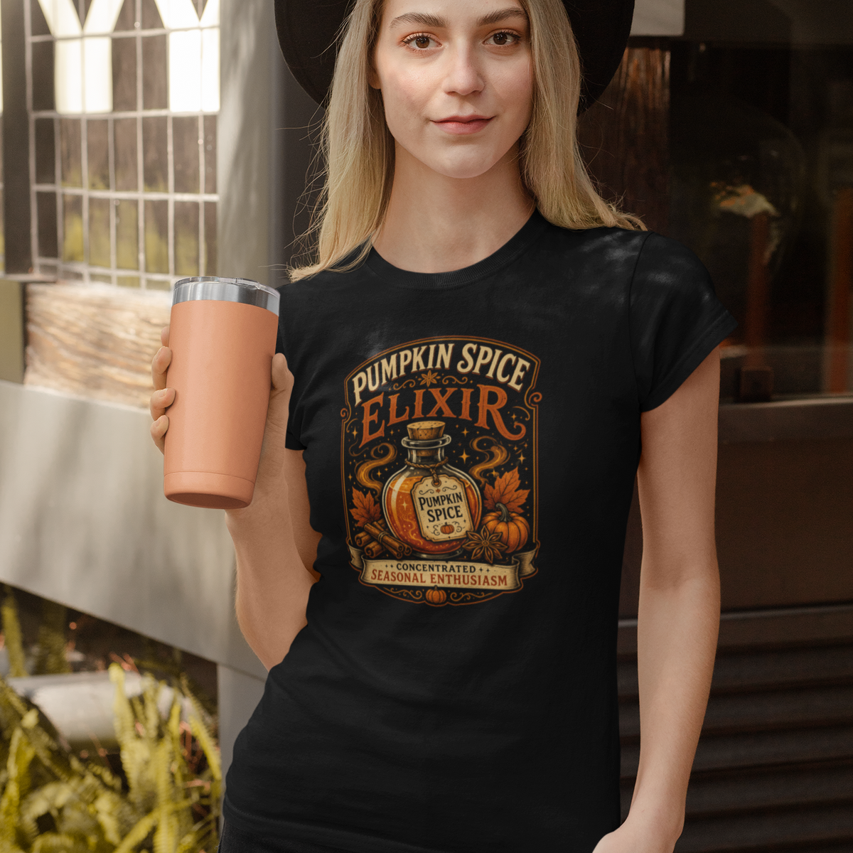 Black crew-neck T-shirt with Pumpkin Spice Elixir front graphic