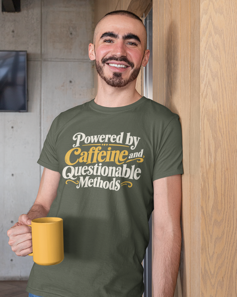 Military green crew-neck T-shirt with "Caffeine and Questionable Methods" graphic
