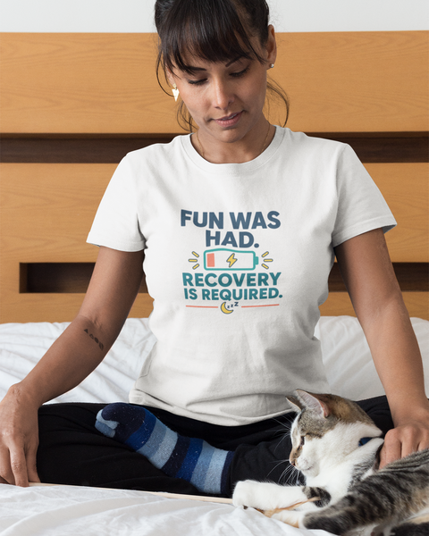 White crew-neck T-shirt with multicolor “FUN WAS HAD. RECOVERY IS REQUIRED.” graphic