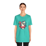 Teal crew-neck T-shirt with shark and flamingo floatie graphic, worn by model