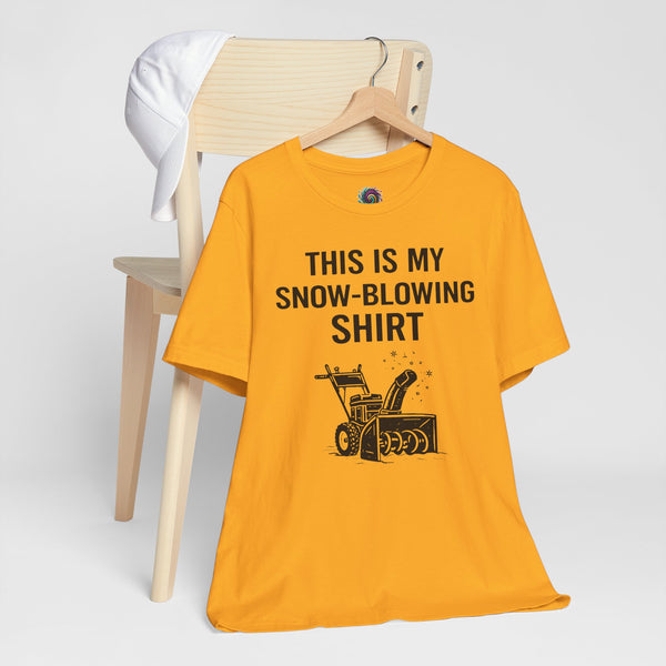Orange short-sleeve T-shirt with “THIS IS MY SNOW-BLOWING SHIRT” text and snow blower graphic.