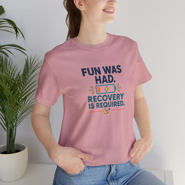 Light pink crewneck T-shirt with multicolor “Recovery is required” graphic on front