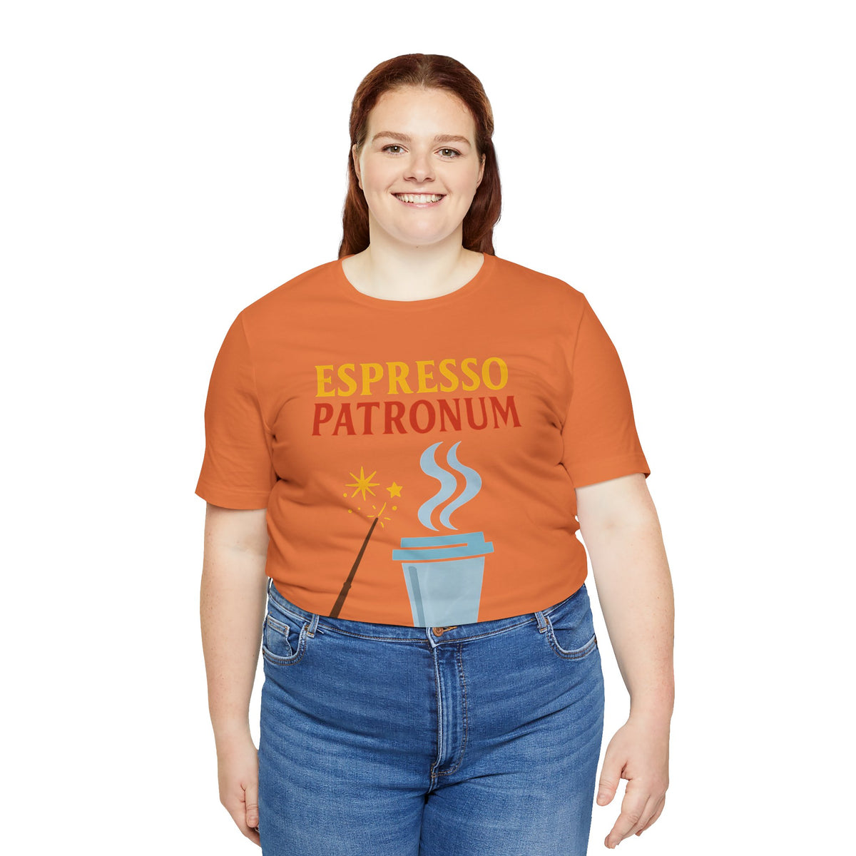 Burnt orange t-shirt with “Espresso Patronum” coffee cup, steam, and wand graphic