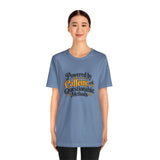 Blue crewneck T-shirt with multicolor “Powered by Caffeine and Questionable Methods” graphic