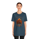 Teal crew-neck T-shirt with centered orange sci-fi pumpkin spice portrait graphic