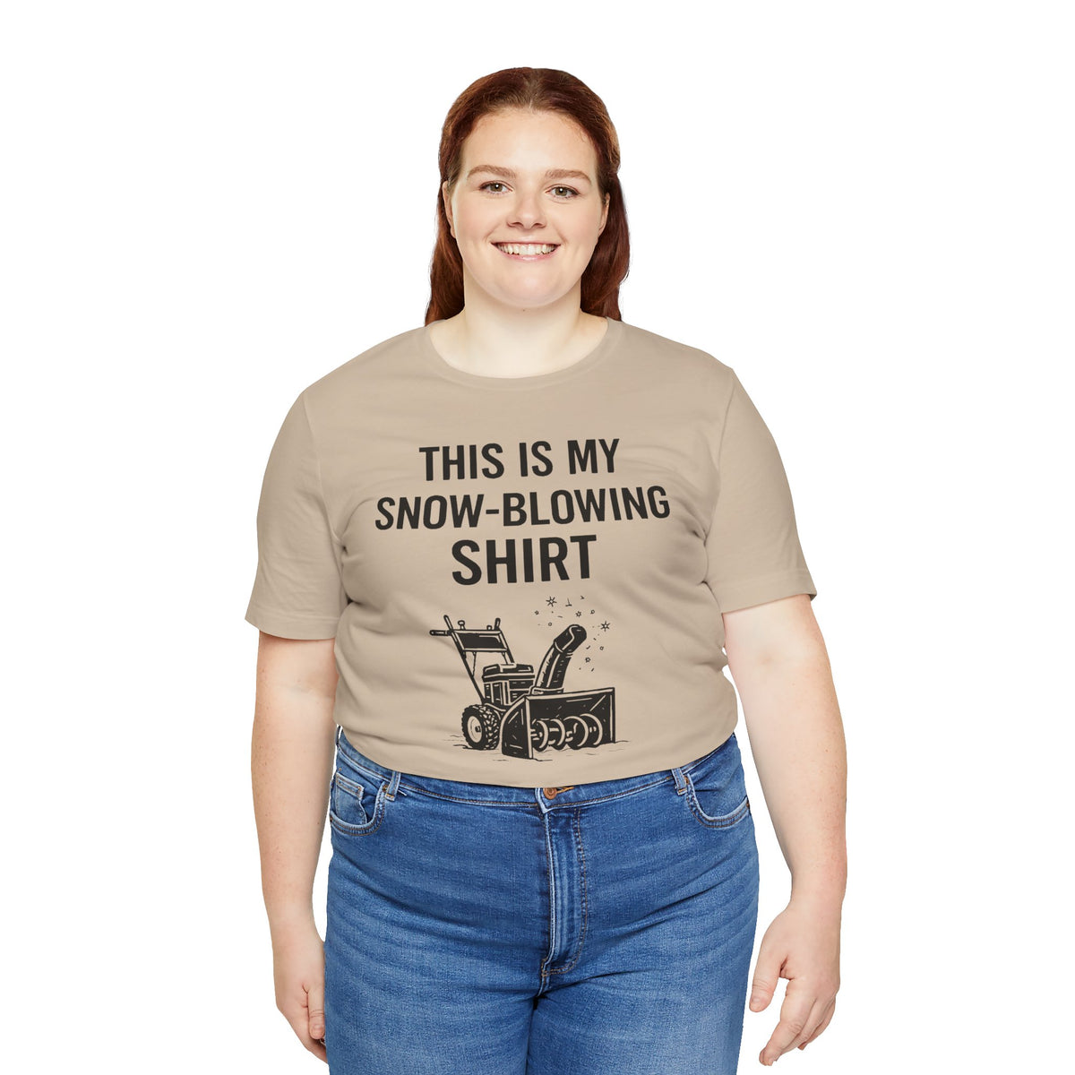 Tan crewneck T-shirt with “This Is My Snow-Blowing Shirt” text and snowblower graphic