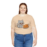 Beige crew-neck T-shirt with cute cat and turkey graphic on model