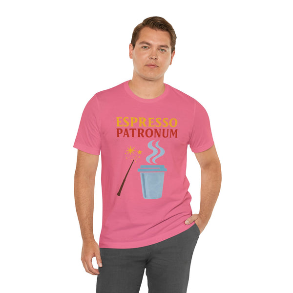 Pink crew-neck T-shirt on model, espresso-themed front graphic with wand and cup