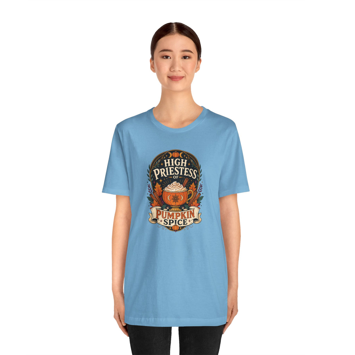 Light blue crew-neck t-shirt with pumpkin spice witch graphic