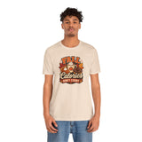 Beige crew-neck T-shirt on model, short-sleeve front graphic.