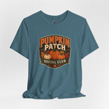 Teal heather T-shirt with Pumpkin Patch Social Club pumpkin graphic on front