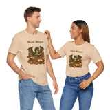 Tan crew-neck t-shirts with Book Dragon graphic worn by two people