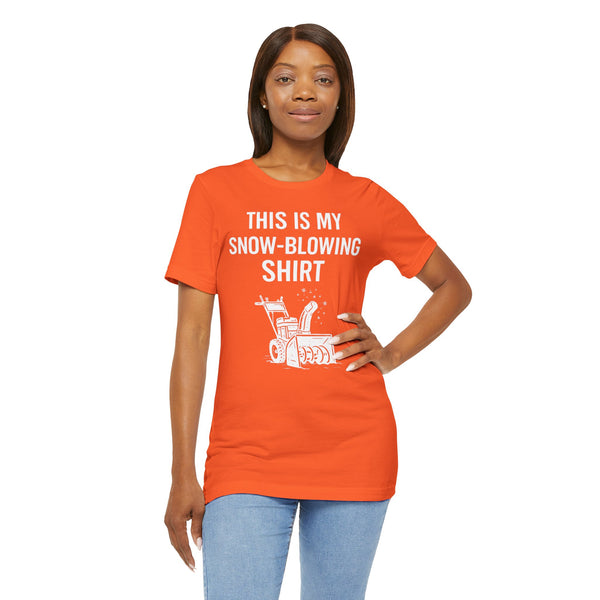 Orange crew-neck T-shirt with centered “This is my snow-blowing shirt” graphic