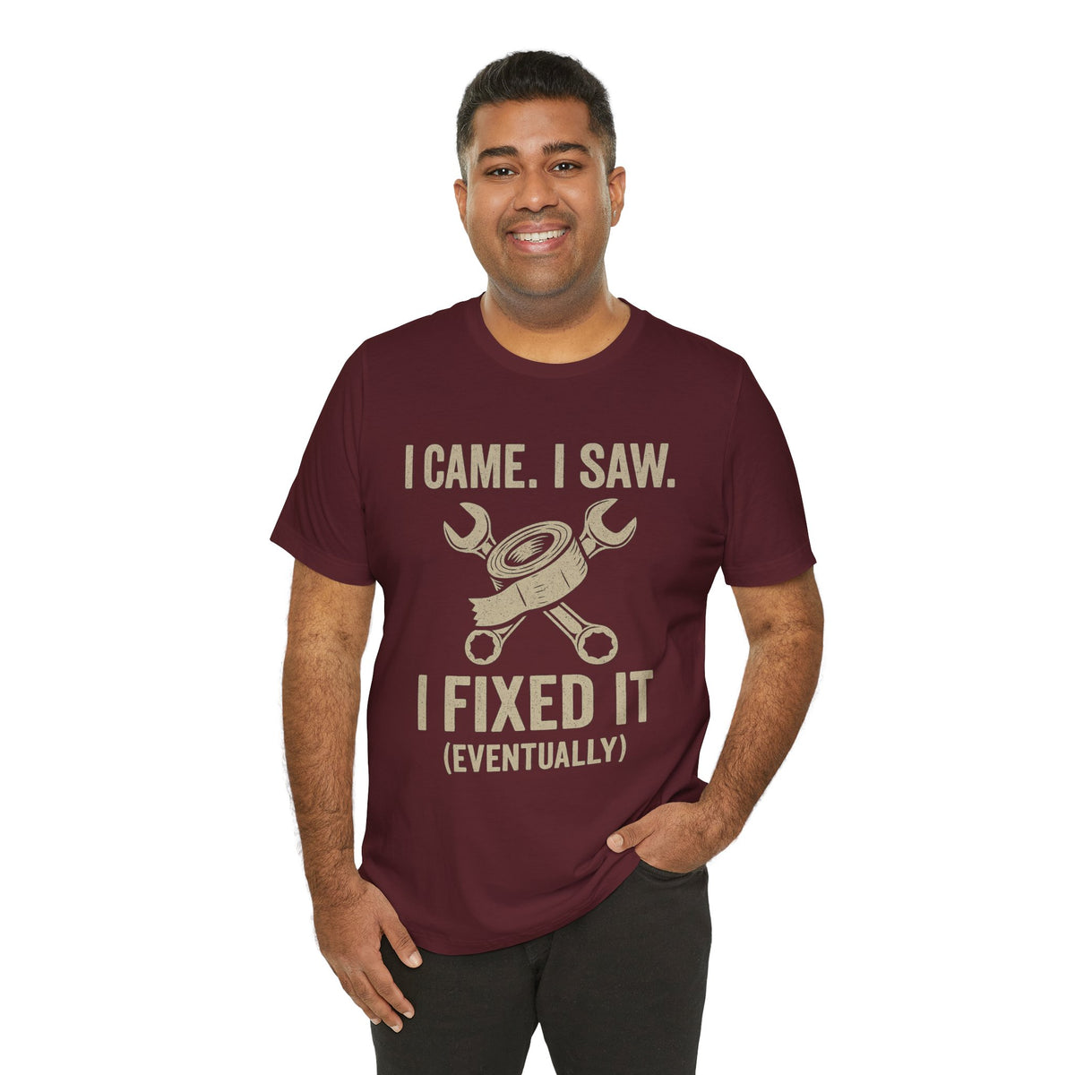 Maroon graphic tee worn by model, front print reads “I came. I saw. I fixed it (eventually)”