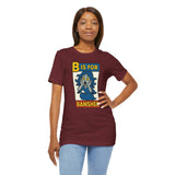 Maroon T-shirt with 'B is for Banshee' graphic, hand on hip