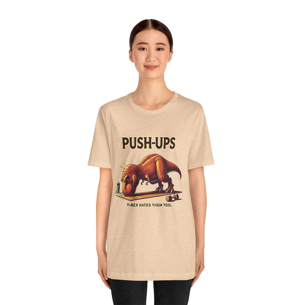 Beige crewneck T-shirt with 'PUSH-UPS' T-rex workout graphic on front