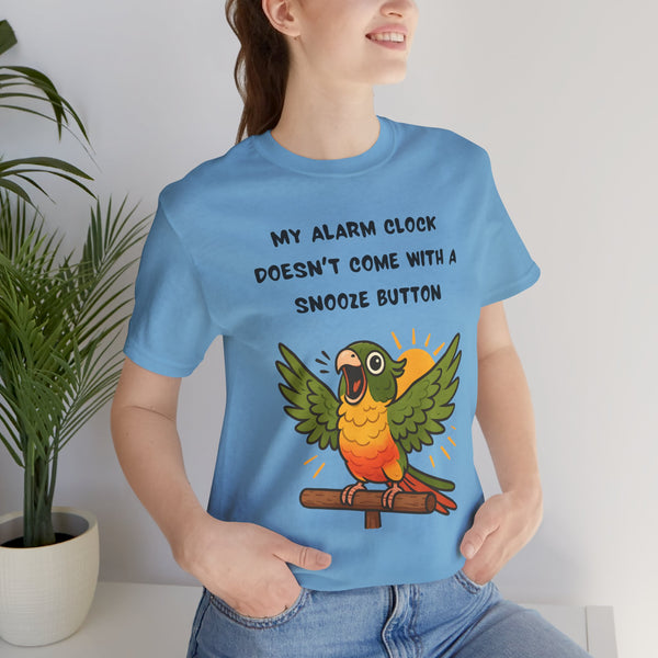 Blue parrot alarm T-shirt close-up on model, chest text and green cheek conure graphic