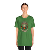 Green crew-neck t-shirt with pumpkin spice taster graphic, front view