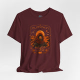 Maroon T-shirt with orange pumpkin spice sci-fi life graphic, flat lay