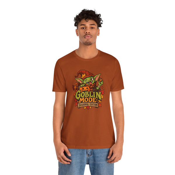 Unisex t-shirt in burnt orange with “Goblin Mode” graphic and seasonal edition text.