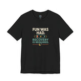 Black crew-neck T-shirt with centered multicolor “FUN WAS HAD. RECOVERY IS REQUIRED.” print