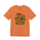 Burnt orange crew-neck graphic t-shirt with goblin mascot and colorful 'Goblin Mode' print