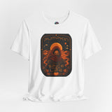 White crewneck T-shirt with orange pumpkin sci-fi face graphic on the front