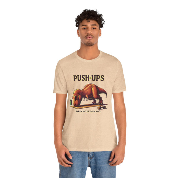 Beige crewneck T-shirt worn by model with 'PUSH-UPS' T-rex workout graphic