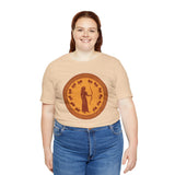 Beige crew-neck t-shirt with orange circular Greek myth figure graphic, front view