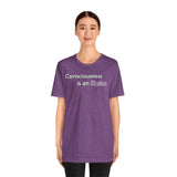Purple crewneck graphic T-shirt with centered 'Consciousness is an illusion' text