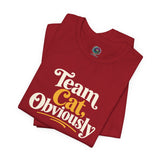 Red crew neck T-shirt flat lay with 'Team Cat, Obviously' slogan graphic.