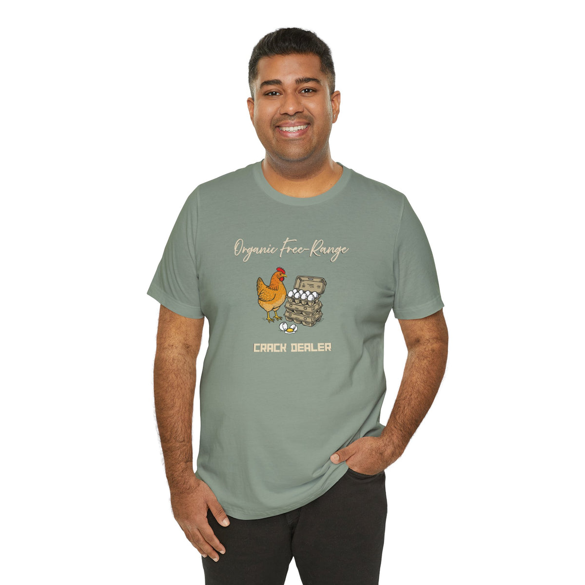 Green crew-neck graphic T-shirt worn by male model; chicken-and-eggs “Crack dealer”