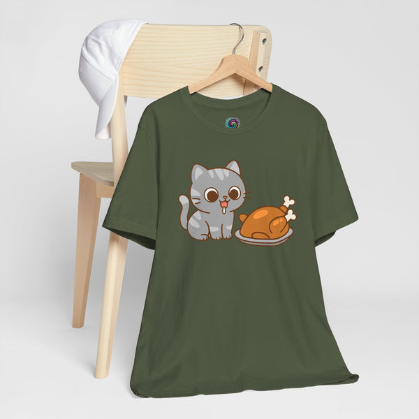 Olive green t-shirt on wooden hanger with cute cat and turkey graphic on front