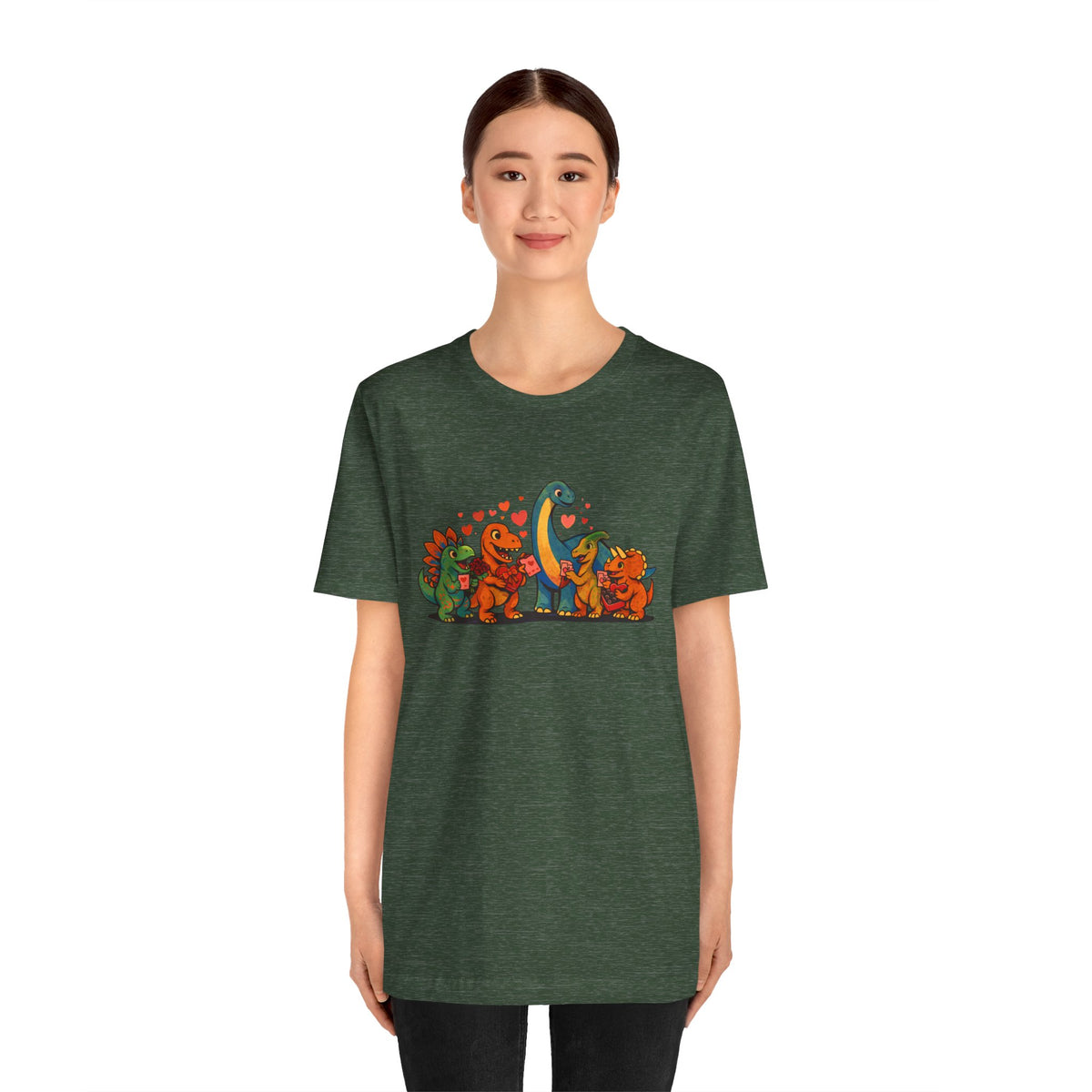 Green crew-neck T-shirt with colorful dinosaur valentine graphic on the front