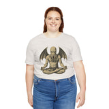 White unisex T-shirt on model, meditating sea monster graphic