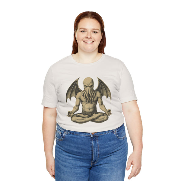White unisex T-shirt on model, meditating sea monster graphic