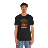 Black crew-neck T-shirt with Pumpkin Spice Elixir graphic, front view on model