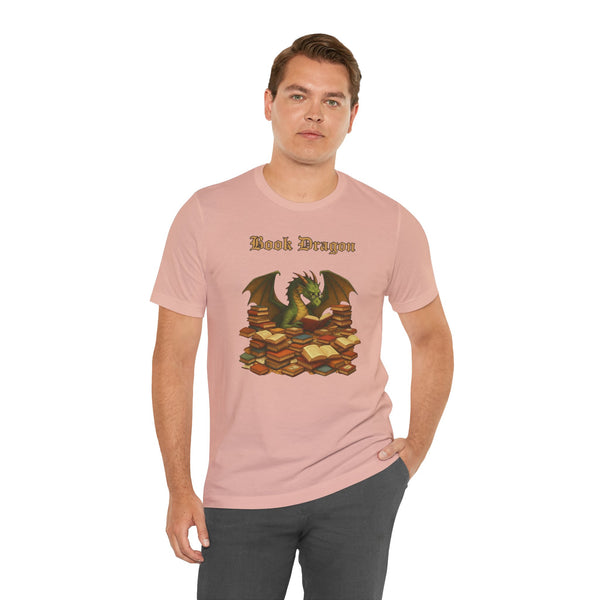 Pink crewneck t-shirt with dragon reading stacked books graphic, side view
