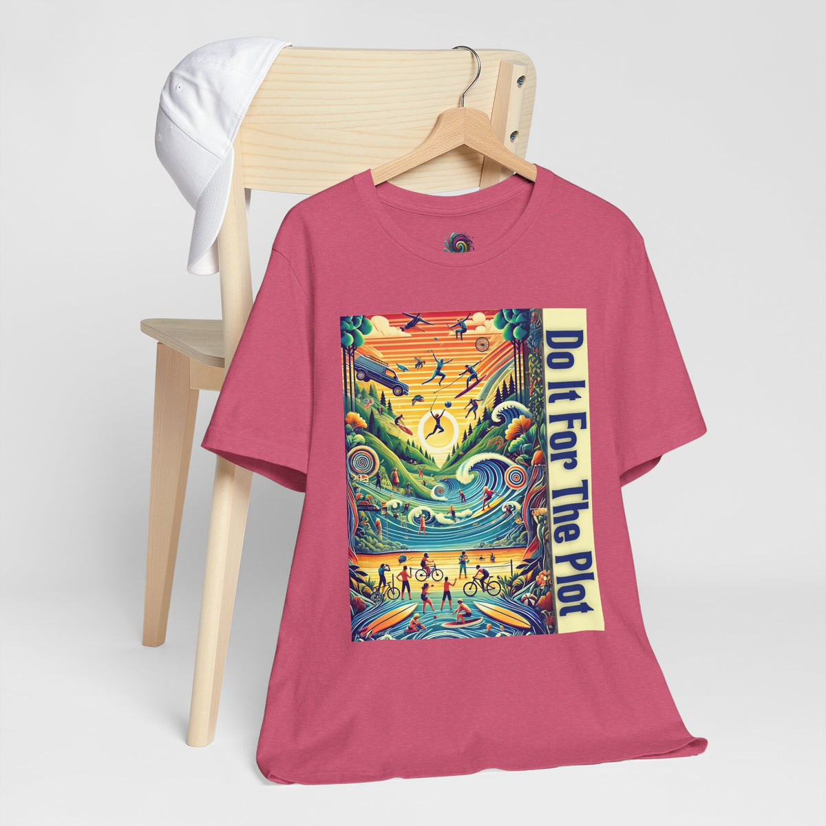 Pink graphic T-shirt with rectangular front print, short sleeves on hanger