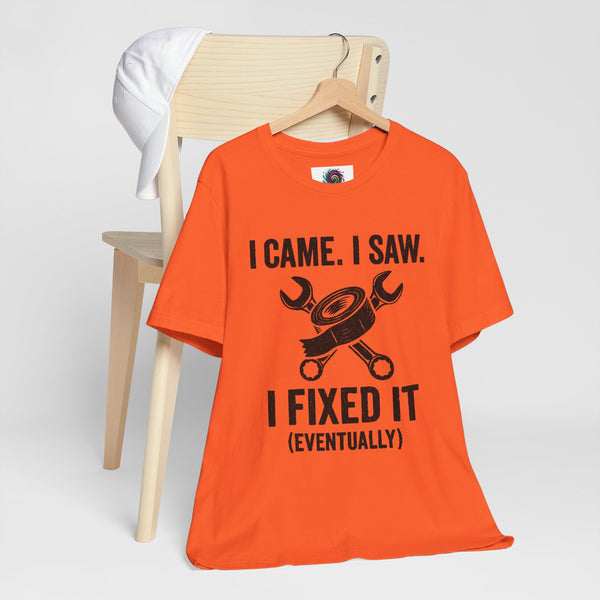 Orange crewneck T-shirt on a wooden hanger, front graphic text and tools illustration
