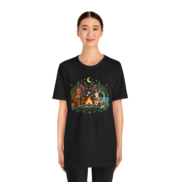Black crewneck T-shirt with campfire cryptids graphic, straight-on front view