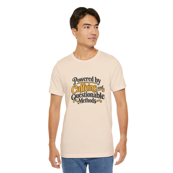 Light cream T-shirt with colorful "Powered by Caffeine and Questionable Methods" print