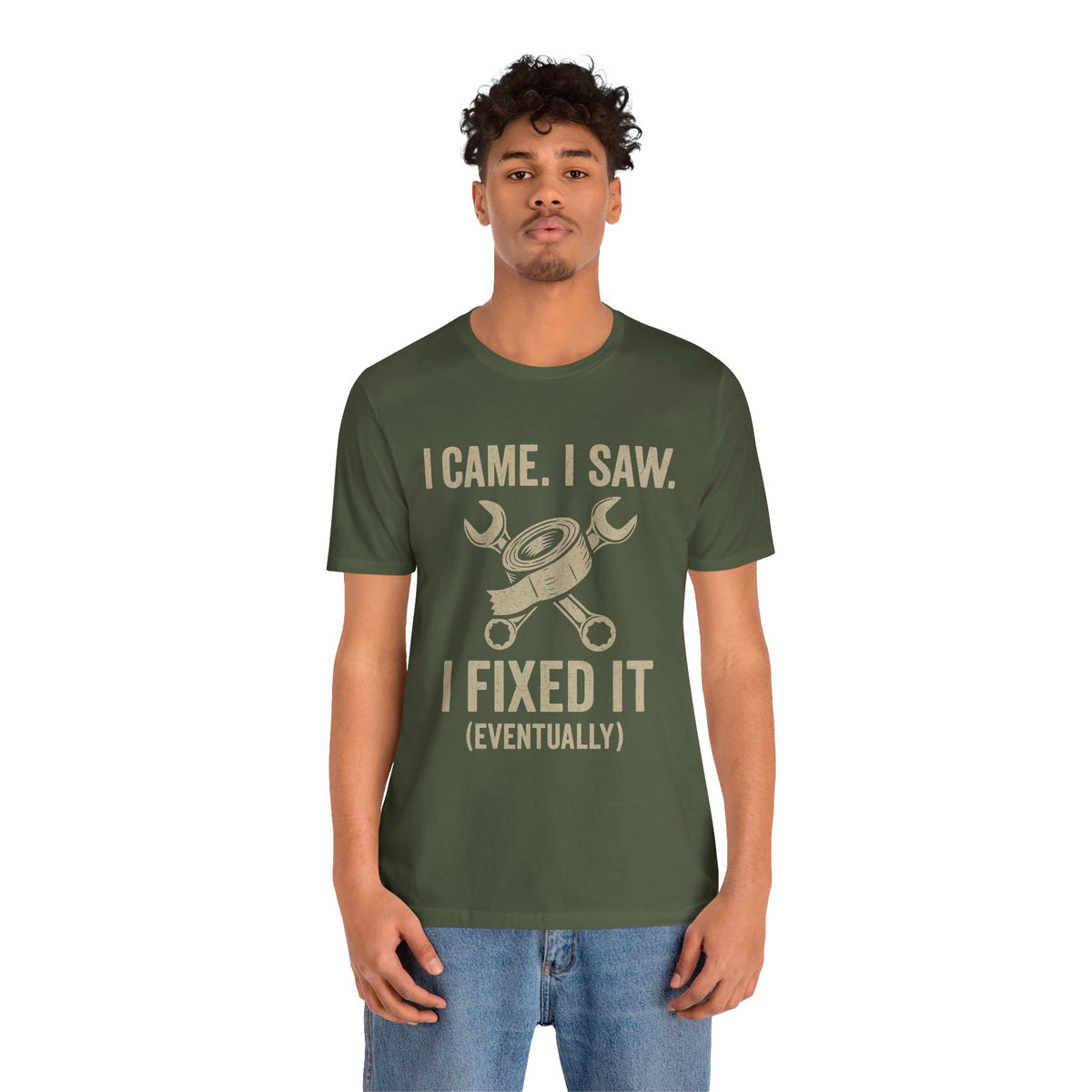Fix-it humor T-shirt in dark green with “I came. I saw. I fixed it (eventually)” print