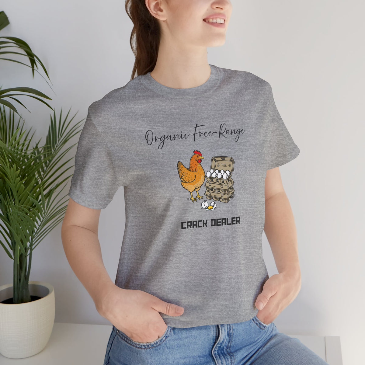 Heather gray T-shirt close-up: chicken-and-eggs graphic with "Organic free-Range" text.