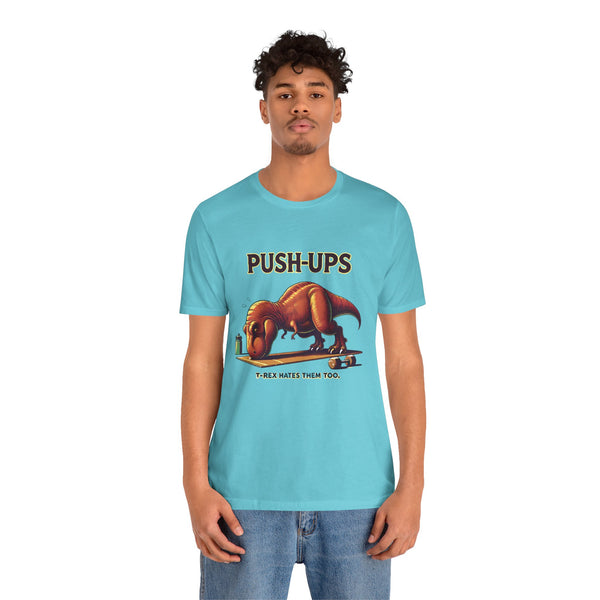 Turquoise T-shirt with T-rex 'Push-Ups' front graphic, worn by male model