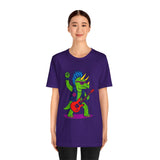 Purple crewneck graphic dinosaur t-shirt with triceratops playing guitar, worn by woman