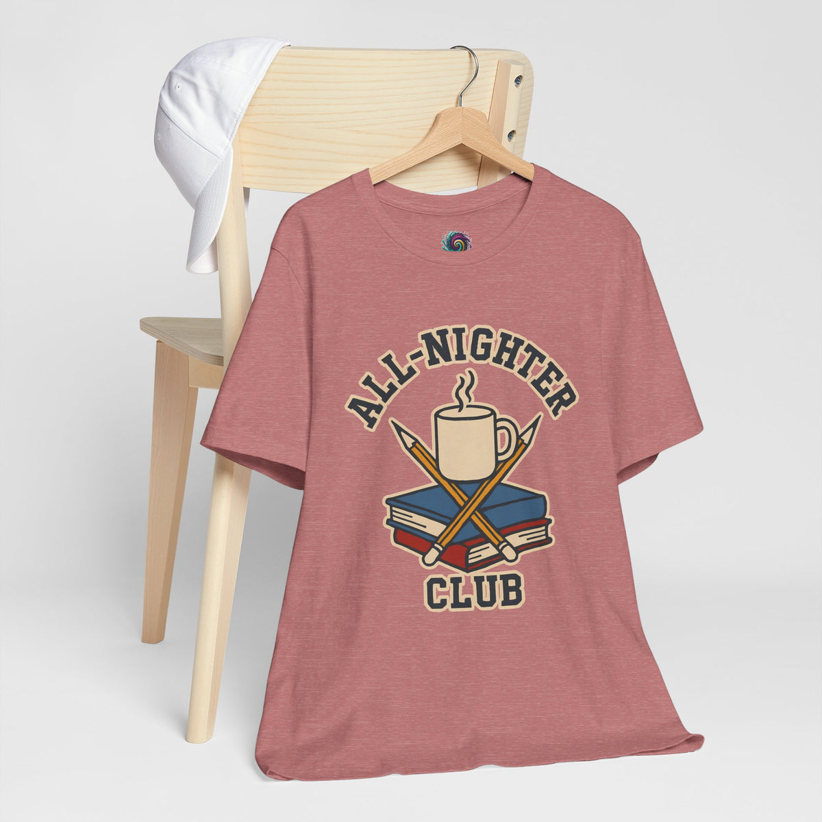 Maroon short-sleeve t-shirt with “All-Nighter Club” coffee and books graphic on front