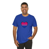 Royal blue T-shirt with center heart bisexual pride flag graphic, worn by man